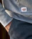 Detail of the step on the right pocket of the Zipped Smocky Hoodie